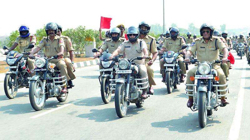 TSSP police take out a motorbike rally on NH-44 at Dichpally in Nizamabad district on Thursday to mark Road Safety Week celebrations. 	 DECCAN CHRONICLE