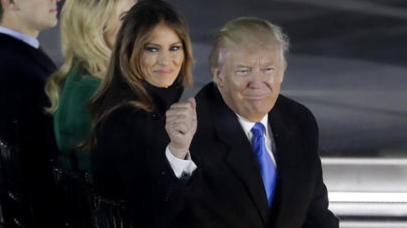 President-elect Donald Trump and his wife Melania Trump attend a pre-Inaugural \Make America Great Again! Welcome Celebration\ at the Lincoln Memorial in Washington, Thursday, Jan. 19, 2017.