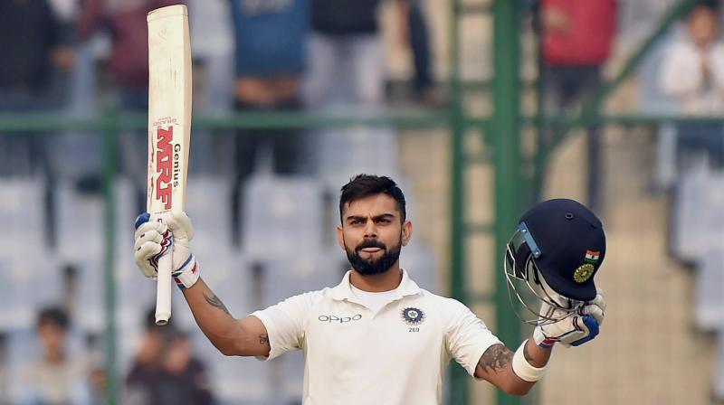 Virat Kohli brought up his record sixth Test double hundred as he and Rohit Sharma continue to dominate the Sri Lanka bowlers on Day 2 of the third Test. (Photo: PTI)