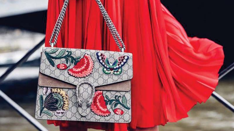 Floral embroidery is now seeing a resurgence on everything from purses and block heels to mule slippers!