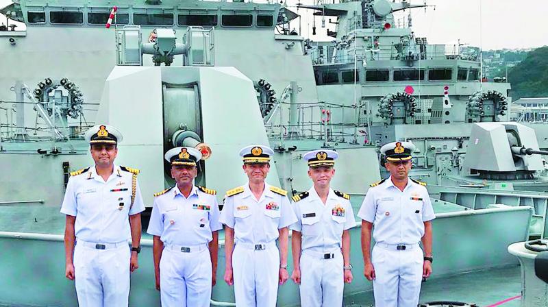 Chief of Staff, JMSDF, Rear Admiral Kenjo Sato along with the Indian Navy personnel during a visit onboard the INS Satpura which arrived at Sasebo in Japan on Thursday.