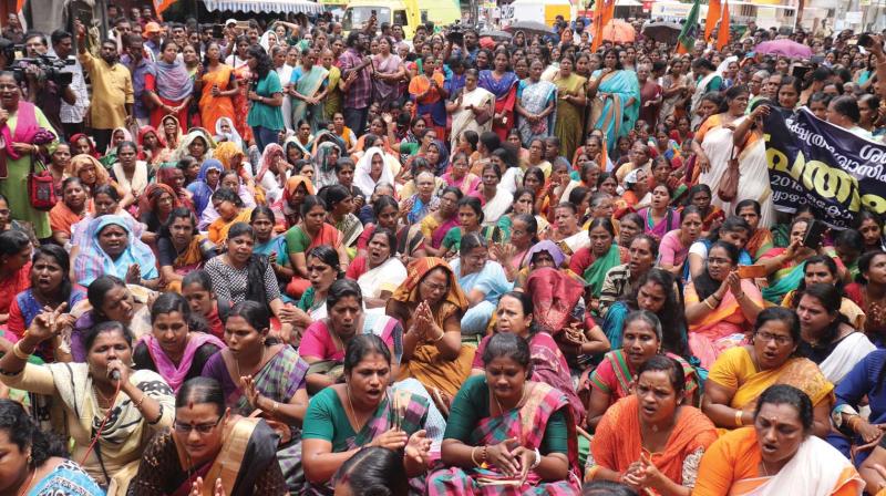 Members of the BJPs Mahila Morcha stage a protest in front of Travancore Devaswom Board office against the Supreme Court verdict allowing women of all ages to enter Sabarimala temple, in Thiruvananthapuram on Thursday. (Photo:Thinkal Kumar)