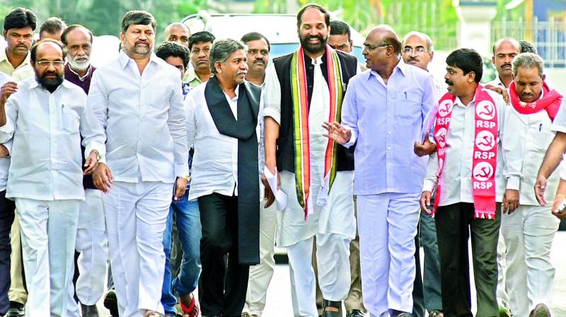 TPCC president N. Uttam Kumar Reddy, along with other Opposition leaders and representatives of peoples organisation come out of the Raj Bhavan after submitting a memorandum to Governor E.S.L. Narasimhan against shifting of Dharna Chowk, in Hyderabad on Thursday. (Photo: DC)