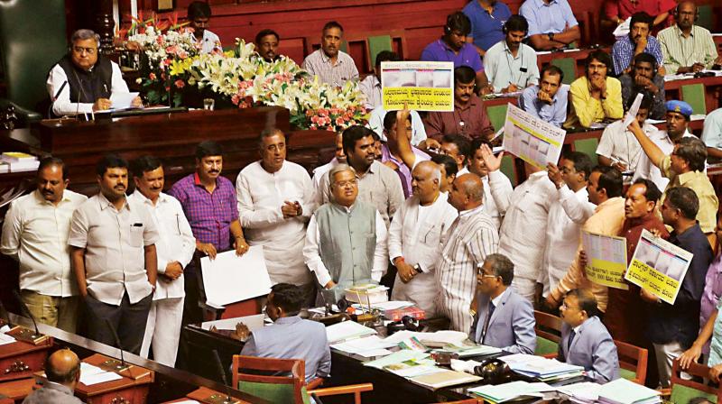 (Clockwise from top) CM Siddaramaiah and BJP leader Jagadish Shettar during the session in Bengaluru on Thursday. BJP members stage dharna during the session. (Photo: KPN)