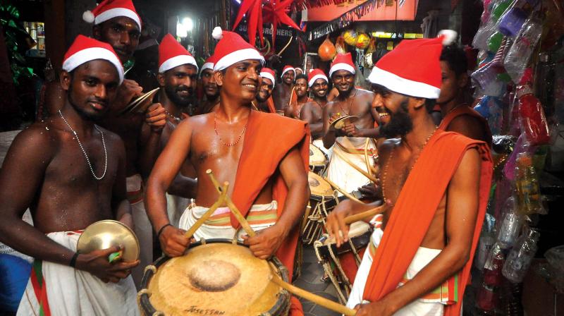 The Baby Bazaar carol committee takes out a  traditional chendamelam as part of the Christmas carol in Kozhikode on Friday. (Photo: DC)