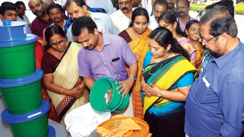 Mayor V. K. Prasanth at the corporations kitchen bin demonstration drive. 	(File pic)