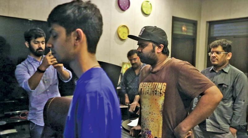 Anirudh and STR at the recording of the song.