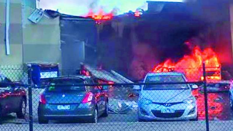 A blaze from a light aircraft which exploded as it smashed into a shopping centre near Melbourne on Tuesday (Photo:  via web)