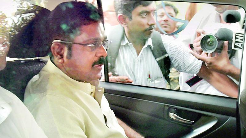 AIADMK leader T.T.V. Dhinakaran arrives to appear before Delhi Police for questioning in connection with an alleged attempt to bribe an EC official for retaining the two leaves party symbol, at the Crime Branch office at Chanakyapuri in  New Delhi on Saturday. (Photo: PTI)