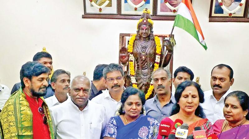 Late AIADMK founder MGRs kin joined the BJP on his birth  centenary on Tuesday. State BJP president  Dr S. Tamilisai Soundararajan and Union  minister Pon Radhakrishnan are also seen. (Photo: DC)