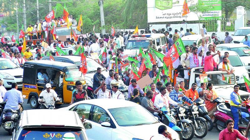 MLC Elections Result: BJP leaders and activists take part in a bike rally as part of the victory rally at circuit house in Visakhapatnam on Wednesday. (Photo: DC)