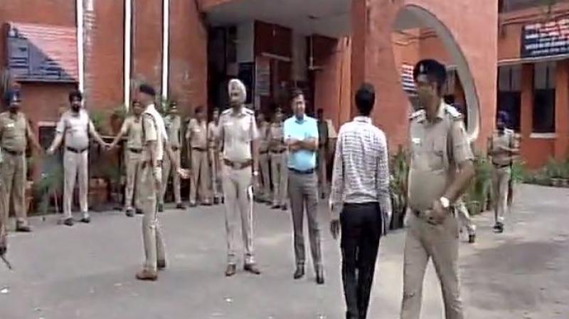 Heavy security at Sector 26 Police station in Chandigarh where Vikas Barala has appeared for questioning. (Photo: ANI | Twitter)