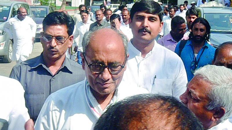 AICC general secretary Digvijay Singh arrives at Gandhi Bhavan in Hyderabad on Thursday. (Photo: DC)