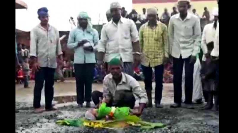 The act is reportedly part of a Muharram ritual and is performed after a wish sought for the child gets fulfilled. (Photo: ANI/Twitter)