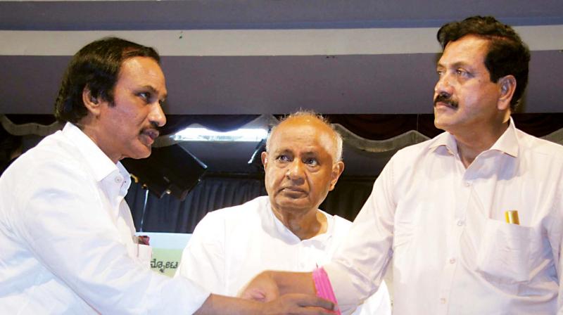 Janata Dal (Secular) president H.D. Deve Gowda, party MLA Y.S.V. Datta and Congress leader B.L. Shankar at a discussion on regional political parties in Bengaluru on Thursday 	 KPN