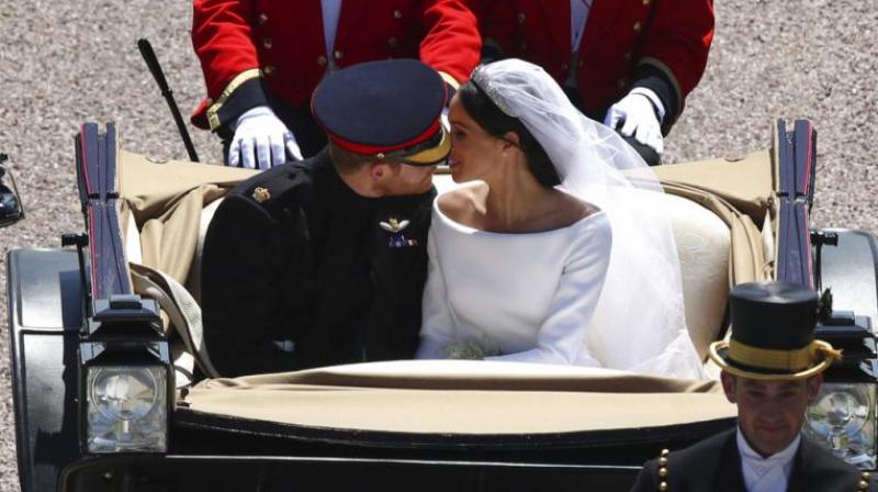The Duchess official web page comes after it was revealed Meghan and Harry have left Windsor Castle and are heading to London to begin married life together. (Photo: AP)