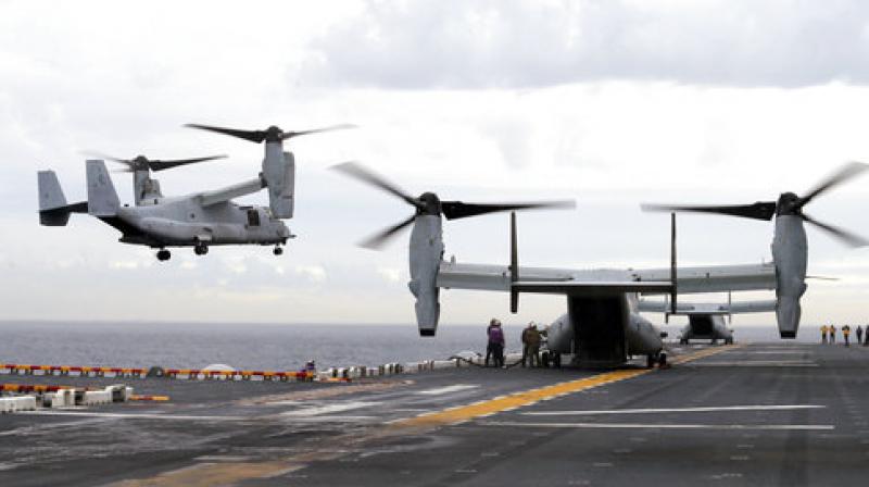 The MV-22 -- a hybrid helicopter-turboprop with a chequered safety record -- has two engines positioned on fixed wingtips that allow it to land and take off vertically. (Photo: AP)