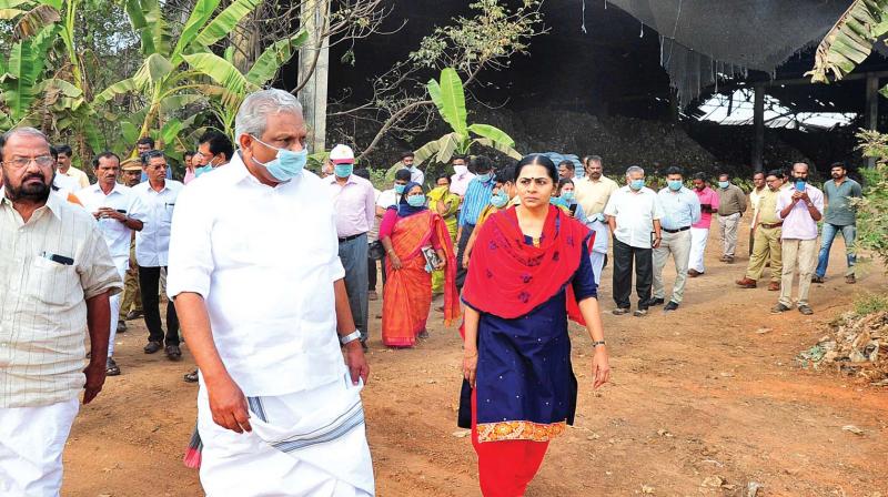 LSGD minister A.C. Moideen, along with Kochi mayor Soumini Jain and senior officials, inspects site of the waste treatment plant at Brahmapuram on Sunday