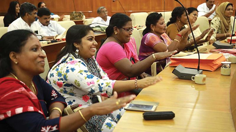 UDFs women councillors thumping the desk as deputy mayor T.J. Vinod (not in picture) presents the budget for the financial year 2019-20.  (ARUN CHANDRABOSE)