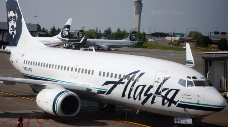 Heidi McKinney, 27, of suburban Portland, was arrested May 8, 2016, after the Alaska Airlines flight landed at Portland International Airport. (Photo: AP)