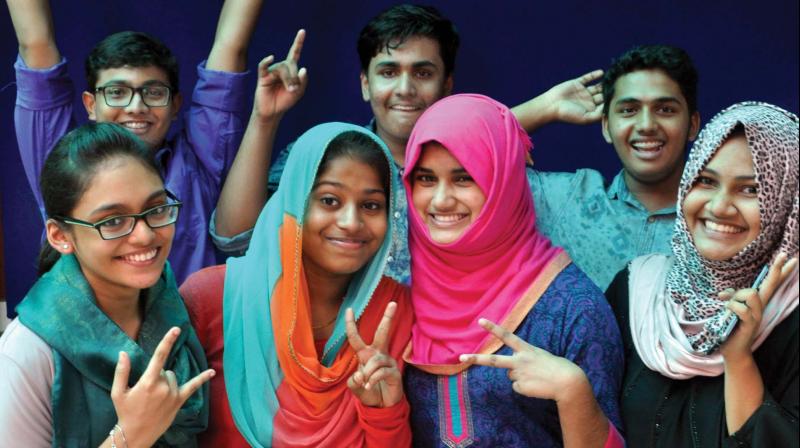 Students at Al-Ameen Public School, Edapally in a celebration mood after the Class XII results were declared, in Kochi on Sunday. (Photo: SUNOJ NINAN MATHEW.)