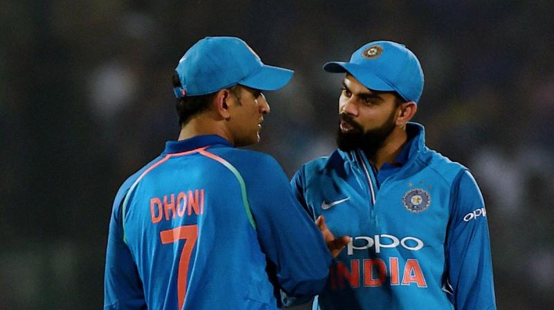 Virat Kohli and MS Dhoni have been instrumental in guiding the two leg spinners in their short careers. (Photo: PTI)