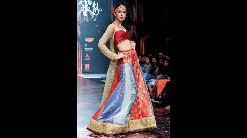 Model sporting a jacket with a lehenga