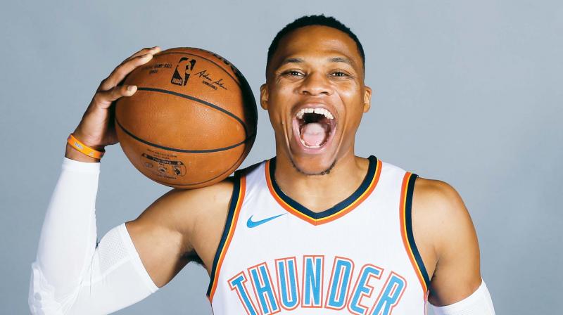 Oklahoma City Thunder guard Russell Westbrook lets out a roar during an NBA basketball media day in Oklahoma City on Monday.  (Photo: AP)