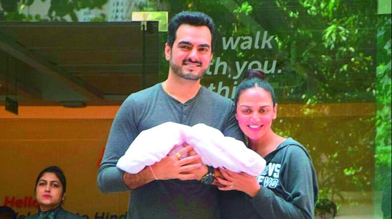 Esha Deol and her husband were photographed exiting the hospital with gleaming smiles.