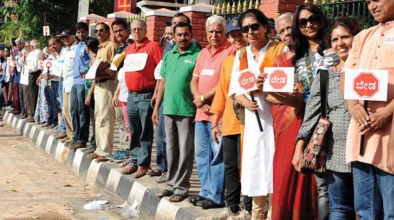 File photo of people protesting against the steel flyover plan, in Bengaluru.