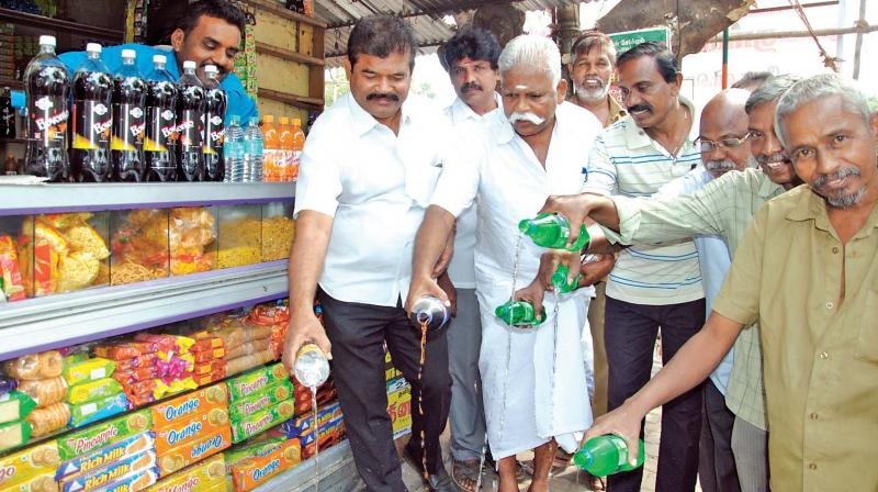 Traders in Perambur stage a protest against the selling of Pepsi and  Coke products on Wednesday. (Photo: DC)