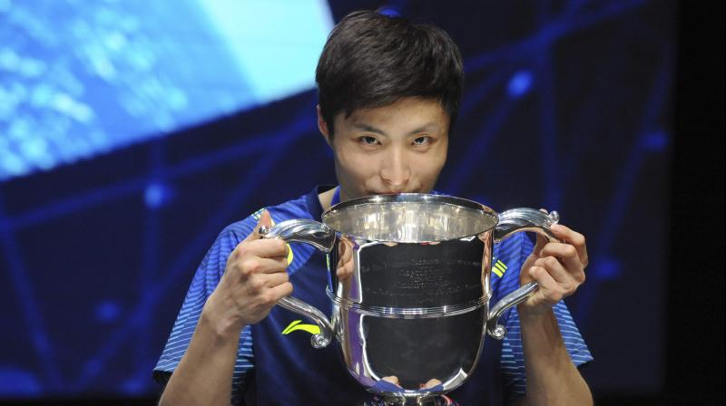 Shi Yuqi beat six-time champion Lin Dan 21-19, 16-21, 21-9 Sunday in a major upset at the All England Championships. (Photo: AP)