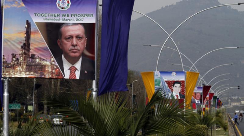 Billboards showing portraits of presidents of Turkey, Turkmenistan and Kyrgyzstan are displayed at a main highway to welcome them in Islamabad, Pakistan, Tuesday, Feb. 28, 2017. Pakistan will host representatives from 10 countries of the Economic Cooperation Organization on Wednesday to finalize a plan for expanding trade and prosperity in the region. (Photo: AP)