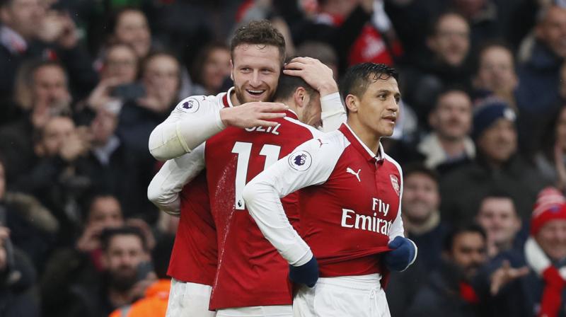 Quick-fire first-half goals by Shkodran Mustafi and Alexis Sanchez earned Arsenal a richly deserved victory over arch rivals Tottenham at the Emirates Stadium. (Photo: AFP)