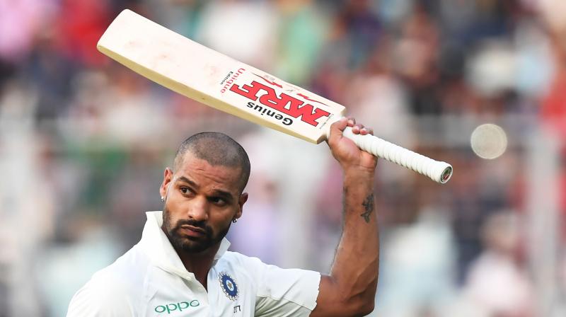 But Rahul and Dhawan made batting look easy on a sunny afternoon -- a welcome change from the rainy start on the first two days -- to keep the Sri Lankan attack at bay. (Photo: AFP)