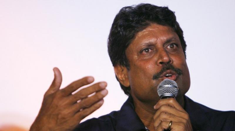 \They (cricketers) can take a break, if they dont want to play...they are professionals. If you (journalists) are a professional, (and if) you cannot write an article, somebody else will write. If you are not professional, you are doing for enjoyment and your passion, then its different,\ Kapil Dev said.(Photo: AFP)