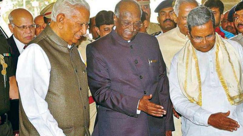 Legislative Council chairman D.H. Shankaramurthy with CM Siddaramaiah in a file photo.