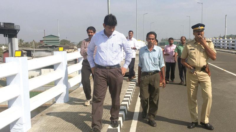 Collector Muhammed Y. Safirulla visits Pathalam bridge on Monday. (Photo: DC)