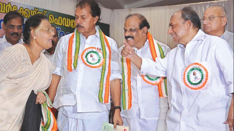 Senior Congress leader A.K. Antony chats with Leelamma Jose, wife of late A.C. Jose, during Joses commemoration meeting in Kochi on Monday. P.T. Thomas, MLA, andformer MP K.P. Dhanapalan are also seen. (Photo: ARUN CHANDRABOSE)