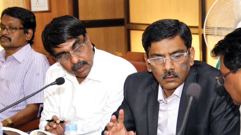 Shailendra Singh, joint secretary, Union commerce and industry ministry (in black suit), during the hearing on traditional fireworks and display in Thrissur on Monday.  (Photo: DC)