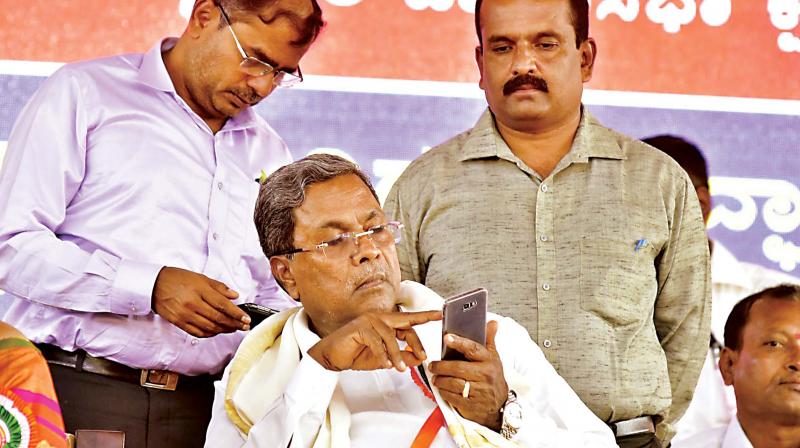 Chief Minister Siddaramaiah at the launch of various developmental projects in Chamarajnagar district on Wednesday.
