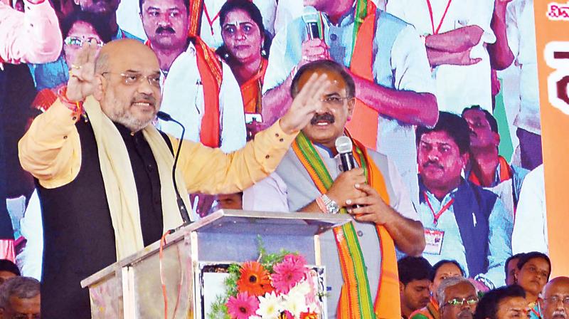 BJP national president Amit Shah at the partys Parivarthana Yatra at Holalkere in Chitradurga district on Wednesday.