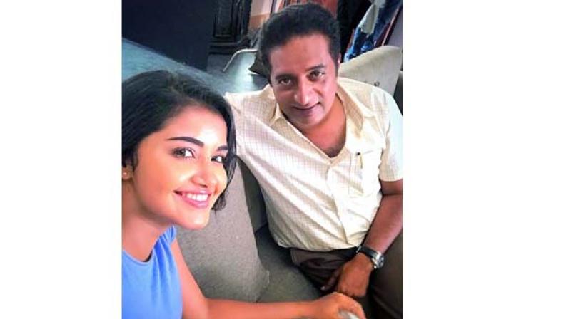 Actress Anupama Parameswaran posted a picture of herself with veteran actor Prakash Raj on her Twitter account. Actress Anupama Parameswaran posted a picture of herself with veteran actor Prakash Raj on her Twitter account.