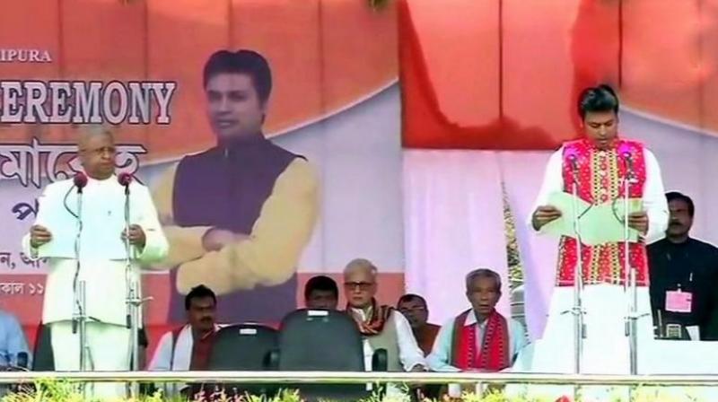 Biplab Deb, long-time RSS volunteer and Tripura BJP president took oath as the chief minister of the northeastern state on Friday at a grand ceremony. (Photo: ANI)