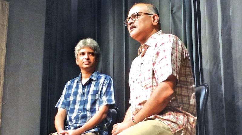 Shekar Dattari interating with AVIS Vishwanadhan at an event in the city.