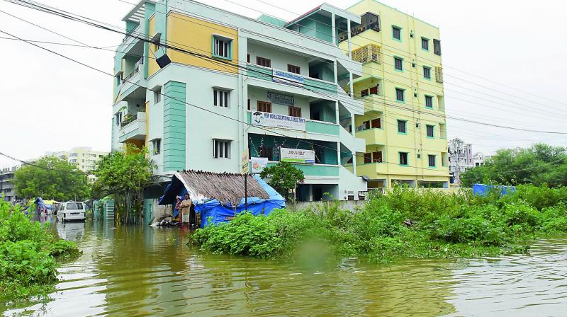 Heavy rains flooded the streets of Miyapur on Saturday. (Photo: DC)