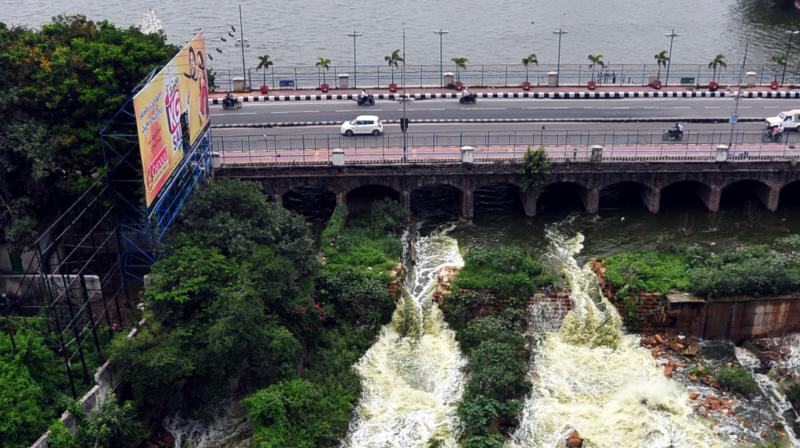 Hussainsagar lake overflows as the flood gates of the lake were opened due to heavy rains on Saturday. (Photo: DC)