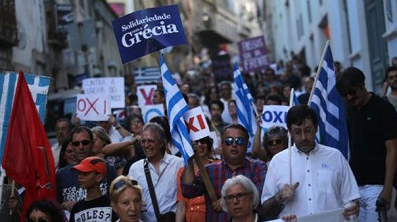 Greece exits the last of its three bailouts on August 20 and hopes to be able to borrow again in international markets after a nearly nine-year debt crisis that shrank the economy by a quarter and forced it to implement painful austerity measures. (Photo: AP)