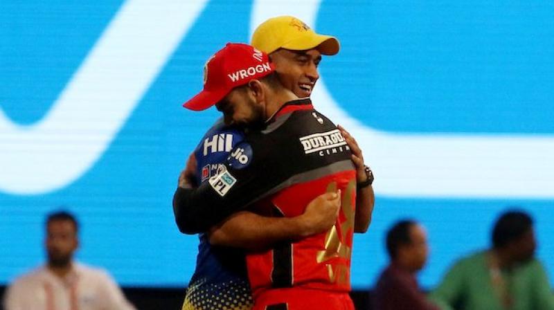 Virat Kohli and MS Dhoni shared a warm hug ahead of the Royal Challengers Bangalore (RCB) versus Chennai Super Kings (CSK) clash in the Indian Premier League (IPL) 2018 at the M Chinnaswamy Stadium here on Wednesday. (Photo: Twitter / Indian Premier League)