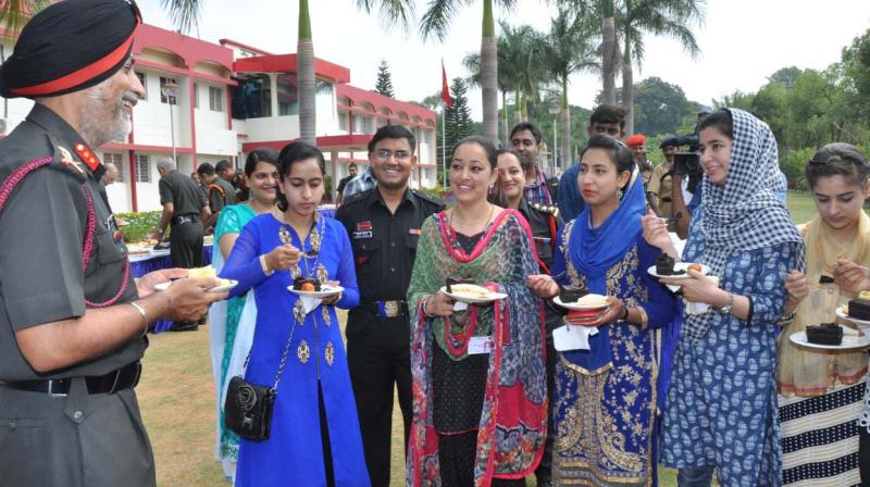 The all-girls delegation from Uri in J&K interact with Army  personnel during their visit to Bengaluru